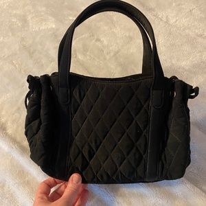 Black quilted Vera Bradley handbag. decorative bows